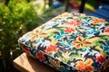 a patterned outdoor furniture cushion on a clean table Royalty Free Stock Photo