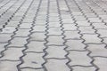 Patterned paving tiles, cement brick floor Royalty Free Stock Photo