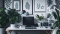 Patterned posters above desk with computer monitor in grey home office interior with plants