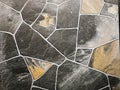 Patterned tile flooring mimics natural stone.