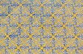 Patterned tiles wall of vibrant yellow and blue colours outside in Valencia, Spain Royalty Free Stock Photo