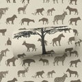 Reveals a prominent acacia tree silhouette adding a savanna like Royalty Free Stock Photo