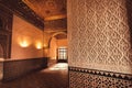 Patterned walls inside 14th century Alcazar royal palace in Mudejar architecture style, Seville. Spain