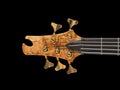 Patterned wood bass guitar headstock black Royalty Free Stock Photo