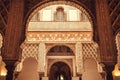 Patternes of the 14th century arches inside Alcazar royal palace in Mudejar architecture style, Seville of Spain Royalty Free Stock Photo