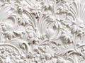 Patterns on the ceiling gypsum sheets of white flowers, plaster background - floral pattern, seamless pattern. Created Royalty Free Stock Photo