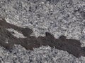 Patterns cracks and shapes of black solidified lava