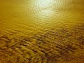 Patterns created ÃÂ¾n the sand by waves and wind Royalty Free Stock Photo