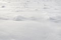 Patterns on a fresh snow texture on a field Royalty Free Stock Photo