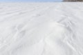 Patterns on a fresh snow texture on a field Royalty Free Stock Photo