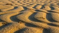 Patterns of sand create a natural wavy texture in this desert Royalty Free Stock Photo