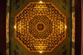 The patterns of wood carved as beautiful deities on the ceiling of the Chinese shrine in Thailand.