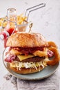 Pattie with onion rings burger with French fries Royalty Free Stock Photo