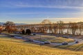 Pattullo Bridge in an early morning of winter with beautiful landscape under golden sunlight Royalty Free Stock Photo