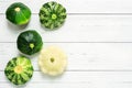 Pattypan squashes on white wooden table background. Fresh dieting vegetables Royalty Free Stock Photo