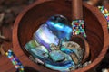 Paua shell pieces in handcrafted beaded wooden bowl Royalty Free Stock Photo