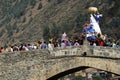 PAUCARTAMBO PERU procession of the Virgen del Carmen carried through the streets and the historic bridge