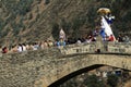 PAUCARTAMBO PERU procession of the Virgen del Carmen carried through the streets and the historic bridge over the river of the