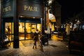 Paul Boulangerie Et Patisserie with customer waiting on bike Royalty Free Stock Photo