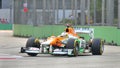 Paul Di Resta racing in Singapore F1 2012