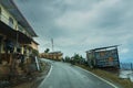 Pauri, Garhwal, Uttrakhand, India - 3rd November 2018 : Monsoon on the hilly streets of Pauri. Rainy street image of busy town on