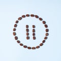 Pause symbol made from coffee beans