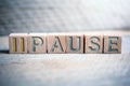 Pause Written On Wooden Blocks On A Board Royalty Free Stock Photo