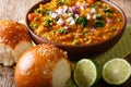 Pav Bhaji is a fast food dish from India, Thick and spicy vegetable curry, fried and served with a soft bread Bun Paav. Horizontal Royalty Free Stock Photo