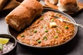 Pav bhaji is a popular Indian street food that consists of a spicy mix vegetable mash & soft buns Royalty Free Stock Photo