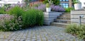 Paved area with stairs and retaining wall in the garden