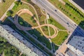 Paved eight shaped path road in the city courtyard at sunny day top aerial view Royalty Free Stock Photo