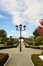 Paved path and lamp post in garden