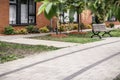 Paved path leading to a modern brick building