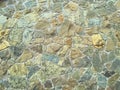 Paved wall with rough granite stones, texture background Royalty Free Stock Photo