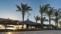 A paved pedestrian path runs along the beach. Royalty Free Stock Photo