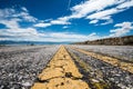 A paved road goes through Antelope Island State Park in Salt Lake City Utah. Very low angle