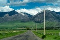 Paved road with leading into the Absaroka Mountain Range near Livingston Montana in Paradise Valley