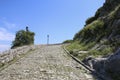 Paved road leading to historic ruins Rozafa Castle in Shkoder, Albania Royalty Free Stock Photo