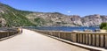 Paved road on top of O`Shaughnessy Dam; Hetch Hetchy Reservoir visible on the right; Yosemite National Park; Hetch Hetchy Valley Royalty Free Stock Photo