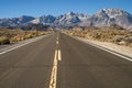 Paved road up to hill Eastern Sierra Nevada mountains Royalty Free Stock Photo