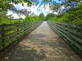 Paved walking trail Silver comet trail in Dallas Georgia long wooden rail bridge