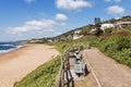 Paved Walkway Green Dune Vegetation Sand and Residential Housin