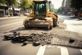 pavement broken and being repaired by a machine