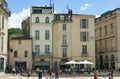 Pavement cafes and elegant town houses in the beautiful French city of Nimes.