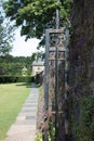 A pavement and the gate in Glasgow's Pollok Country Park Royalty Free Stock Photo