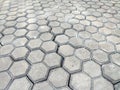 Pavement hexagonal stone background. Hexagonal paving cobble texture laid on city street