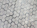 Pavement hexagonal stone background. Hexagonal paving cobble texture laid on city street