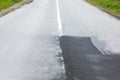 Pavement repair. Asphalt road in the countryside