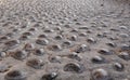 Pavement of river stone and concrete background. Abstract background with round pebbles stones Royalty Free Stock Photo