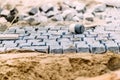 Pavement rocks, granite cobblestone blocks - details of path or sidewalk construction